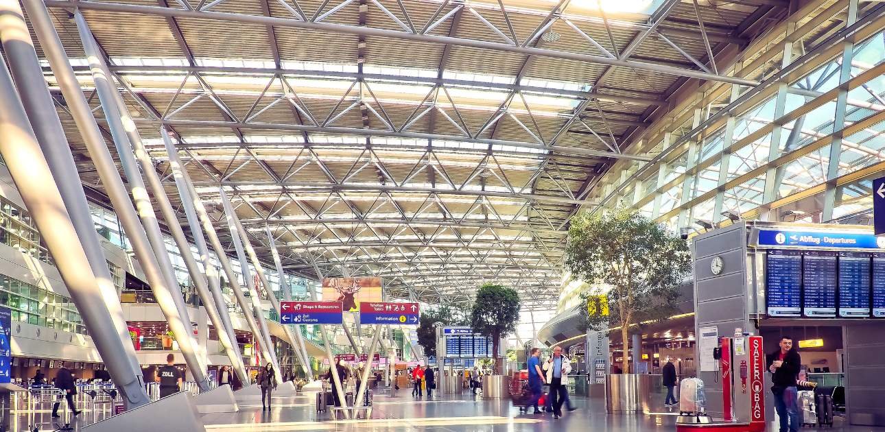 Modern airport terminal interior representing global trade, logistics, and business connectivity at DAFZA – Dubai Airport Free Zone.