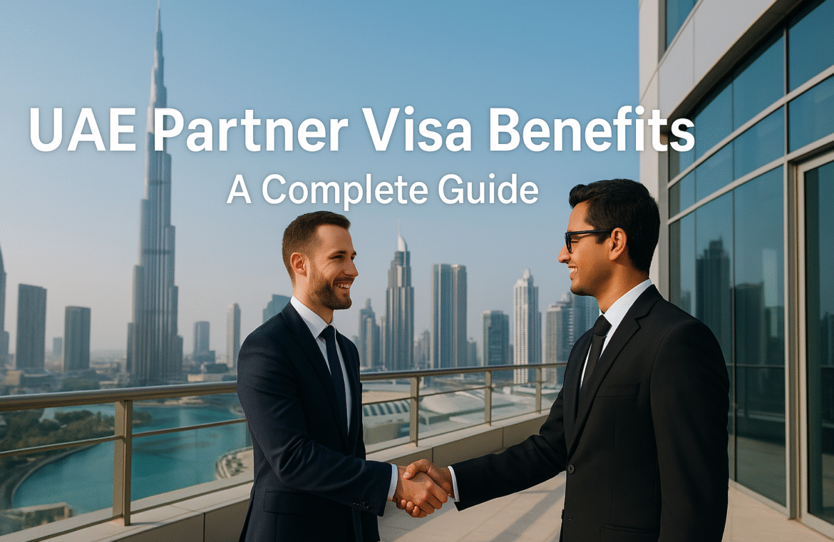 Two business partners shaking hands on a terrace with the Burj Khalifa and Dubai skyline in the background, symbolizing UAE Partner Visa Benefits such as business ownership, partnership opportunities, and long-term residency.